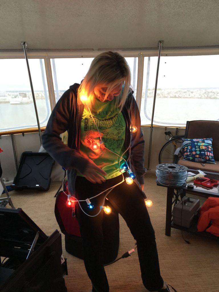 I think she's confused about where the lights are supposed to go....