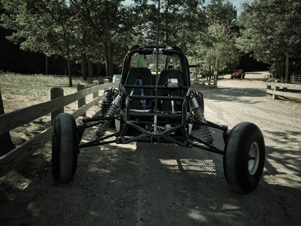 Emily's buggy after and hour of pounding hell. Pretty sure the wheels aren't supposed to turn inward like that (broken tie rod)...
