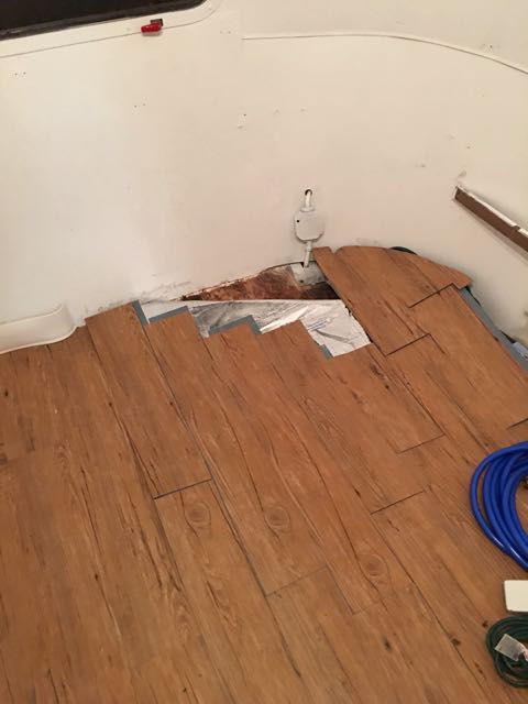 The laminate partially removed over the soft spot.